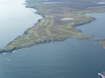 Oblique aerial view of Whalsay Golf Course with Skaw beyond, looking WSW.