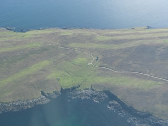 General oblique aerial view of Whalsay Golf Course and the enclosure, looking SSE.