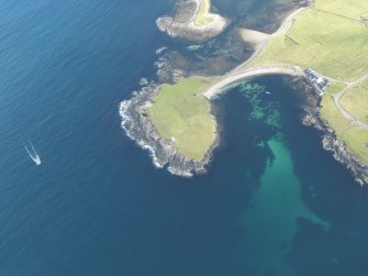 Oblique aerial view of Suther Ness Lighthouse, looking NE.