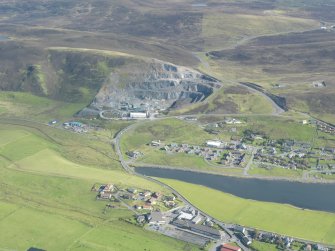Oblique aerial view of Scord Quarry, Scalloway, looking NE.