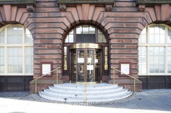 View of the main (Courier Place) entrance on the east elevation of the Courier Building