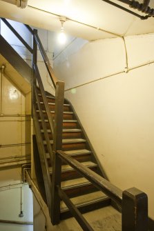 Interior. Detail of stairway to basement.