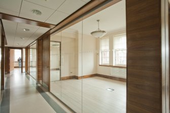 Interior. General view of new corridors and glass fronted offices.