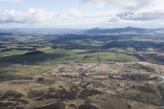 General oblique aerial view of Lochelbank Hill Windfarm with the Lomond Hilsl in the distance, taken from the NW.