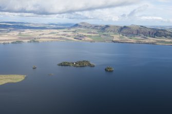 General oblique aerial view of Loch Leven centred on Loch Leven Castle with the Lomond Hills beyond, taken from the SW.