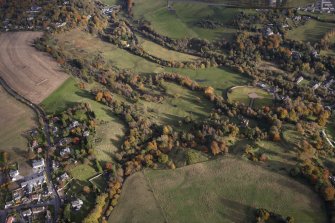 Oblique aerial view of Mavisbank House and policies, looking E.