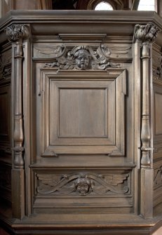 Interior. Detail of carved panel on font