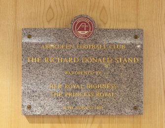 Interior. Detail of commemorative plaque in the Richard Donald hospitality suite within the Richard Donald stand.