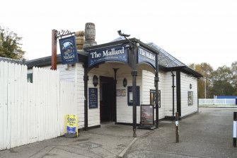 General view of the platform building, now a public house, adjacent to main station building, taken from the west.