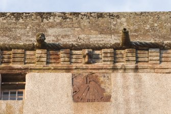 Detail of sun dial on parapet of south front.