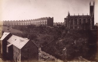 View from Queensferry Bridge, Edinburgh, showing Belgrave Crescent, Holy Trinity Epsicopal Church and Miller Row, Granary.
Titled: 'Belgrave Crescent, Edinburgh.
PHOTOGRAPH ALBUM N0.195: GEORGE WASHINGTON WILSON ALBUM.

