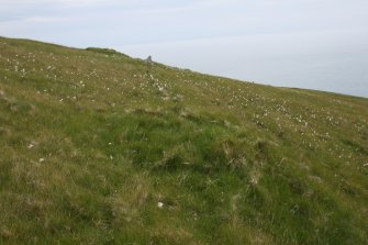 A peat stand overlying a stone and turf dyke on the NW flank of Toa Rona, taken from the SW.