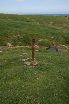 One of the cast iron stanchions from a post and wire fence across the S end of Fianuis, taken from the S.