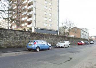 General view of the perimeter walls of the former Maryhill Barracks site, taken on Kelvindale Road from the west.