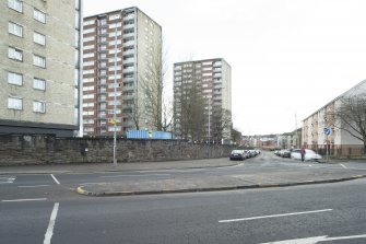 General view of the perimeter walls of the former Maryhill Barracks site, taken from the north east, at the junction of Maryhill Road and Kelvindale Road.