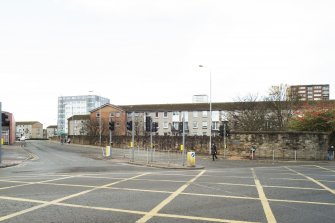 General view of the perimeter walls of the former Maryhill Barracks site, taken at the junction of Maryhill Road and Garioch road from the north east.