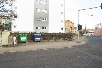 General view of the perimeter walls of the former Maryhill Barracks site, taken at the junction of Wyndford Road and Garioch Road from the south.