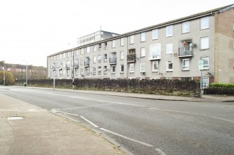 General view of the perimeter walls of the former Maryhill Barracks site, taken on Garioch Road from the north.