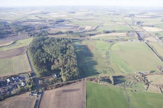 Oblique aerial view of the archaeological evaluation trenches in advance of the A75 Dunragit Bypass construction.