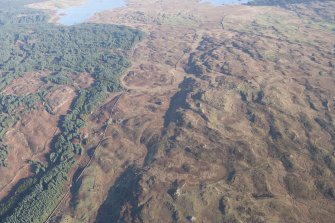 General oblique aerial view of Garheugh Fell, looking NE.