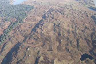 General oblique aerial view of Garheugh Fell, looking NE.