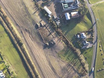 Oblique aerial view during excavation.