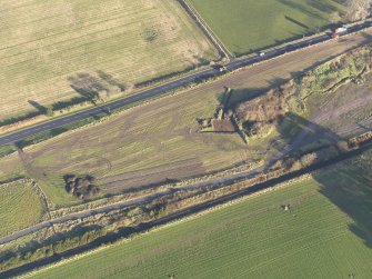 Oblique aerial view during excavation.