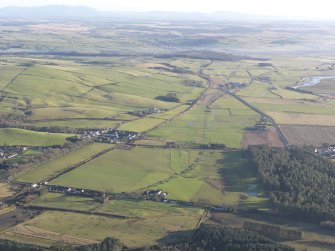 Oblique aerial view of the archaeological evaluation trenches in advance of the A75 Dunragit Bypass construction.