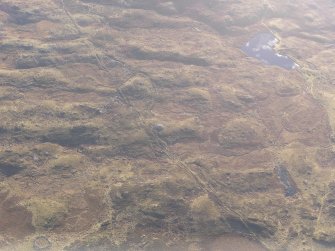 Oblique aerial view centred on Cairn Buy, looking SSE.