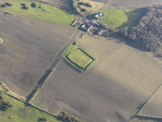Oblique aerial view of Rispain Camp and Rispain farmstead, looking SE