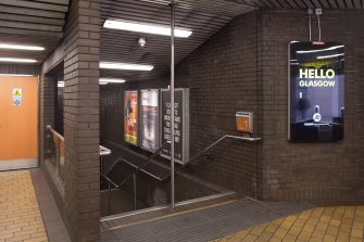 Interior. View of staircase leading to platform level within the concourse of Bridge Street subway station