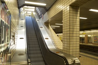 Interior view looking up escalator linking platform and escalator levels within Govan Cross Subway Station, 771-5 Govan Road, Glasgow.