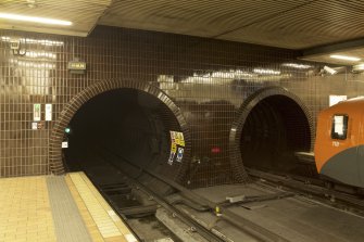 Interior view of tracks and tiled tunnel openings within Govan Cross Subway Station, 771-5 Govan Road, Glasgow.