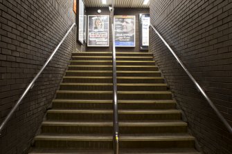 Interior. View looking up from mid-landing of main staircase towards concourse of Kelvinhall subway station