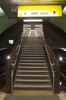 View looking up the main stair linking platform and concourse levels within Cowcaddens subway station