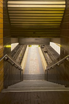 View looking down main stair of St George’s Cross subway station to platform