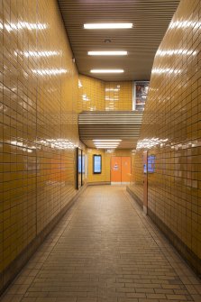 View from lower level looking into tiled double-height stair hall of St George’s Cross subway station