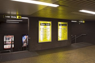 View of stair landings and network maps within the concourse of Buchanan Street subway station