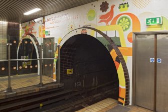 View of tunnel openings and fire exits at platform level of Buchanan Street subway station