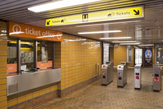View of ticket office, turnstiles and signage within Cessnock subway station