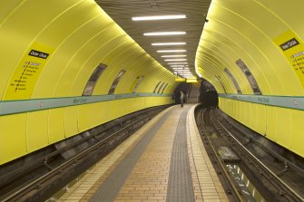 View looking along the island platform and tracks of West Street subway station