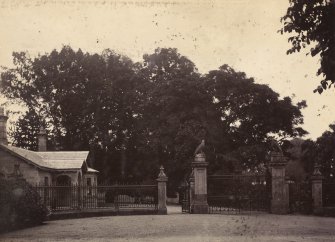 General view of gateway with eagle sculptures and lodge, Cawdor Castle, Nairn
