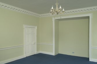 Ground floor. Dining room from south showing buffet niche.