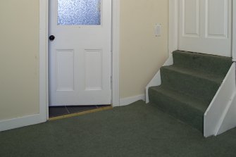Attic floor. Landing steps showing rise of floor level above drawing room (salon).