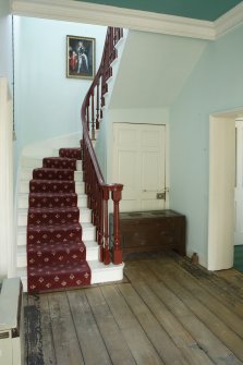 Ground floor. Inner hall. Main staircase from south west.