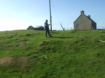 The small enclosure S of the croft house, with Mr John Sherriff awaiting a GPS reading