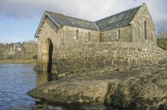 General view of Achranich boathouse, with Ardtornish House in the background