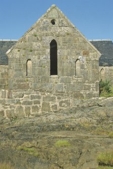 South gable of the attached private room at Achranich boathouse. The two smaller lancet windows have been blocked. The oculus in the gable bears in its four corners the date figures '1853'.