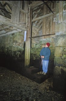 Internal timbering by the stone steps leading down from the entrance door to the boat grounding, Achranich boathouse, 2000.