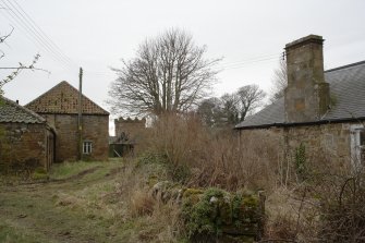 View from cottage to north of steading, looking back to the rear of the south east range, taken from north east.
